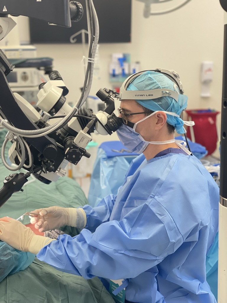 Dr. Dean Page performing microscopic ear surgery